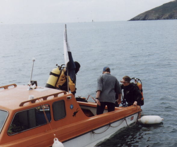 The MADU Dive Team over the site of